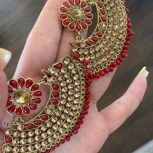 Gold and red hanging earrings